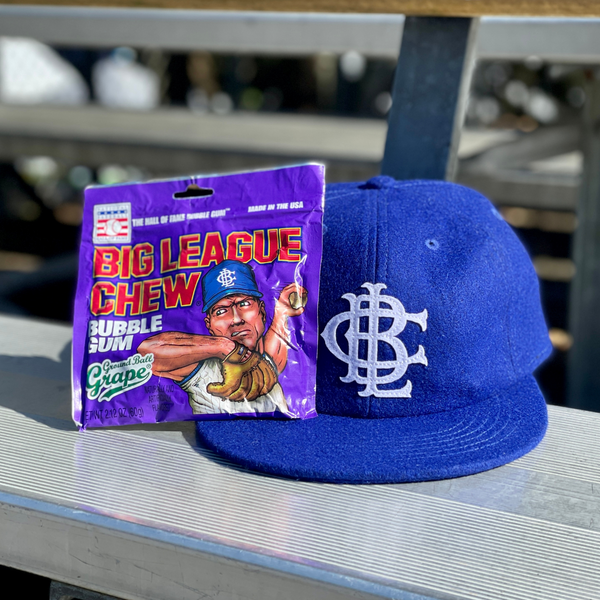 an "outta here original" hat