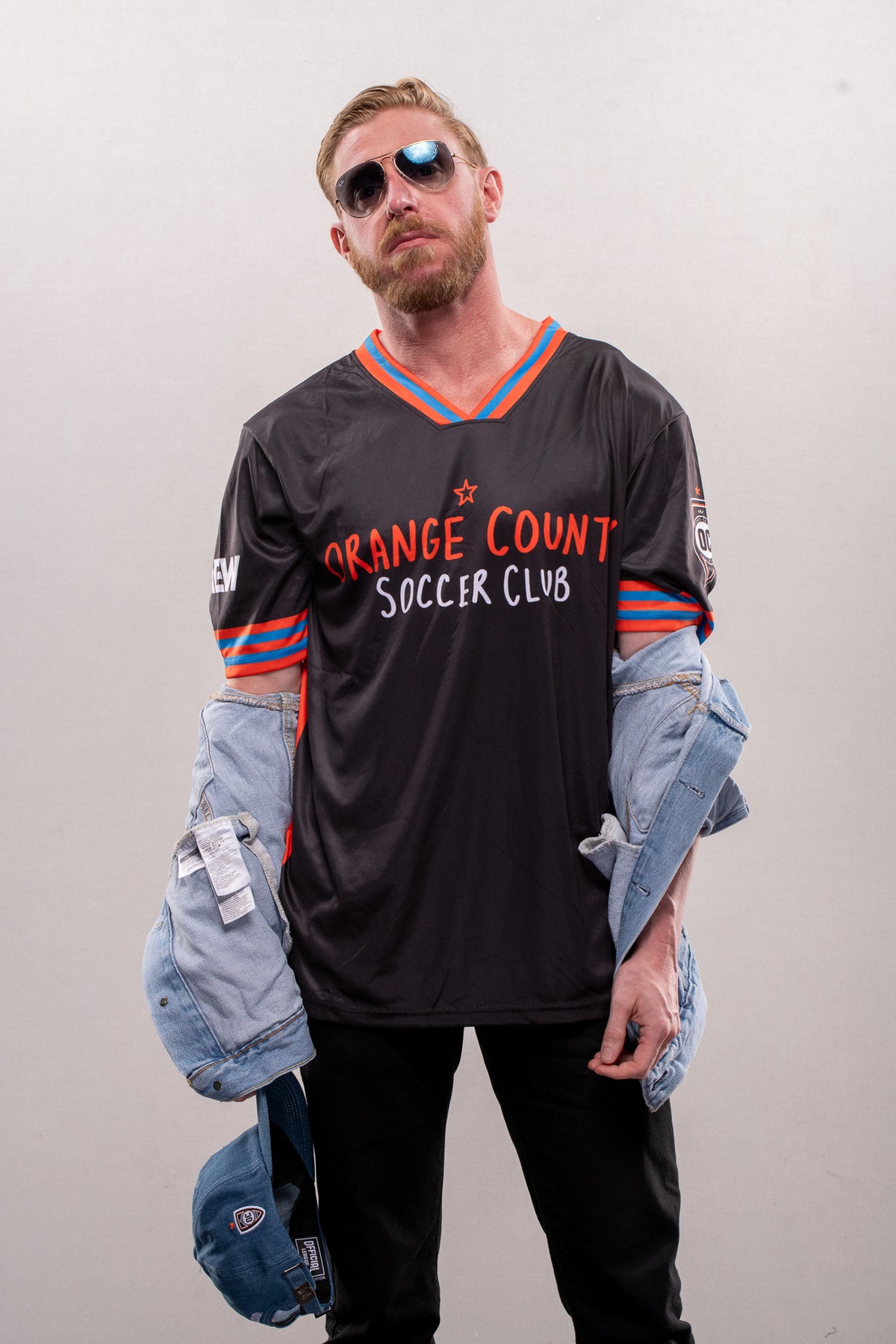 Orange Cassidy wearing his Orange County SC collaboration