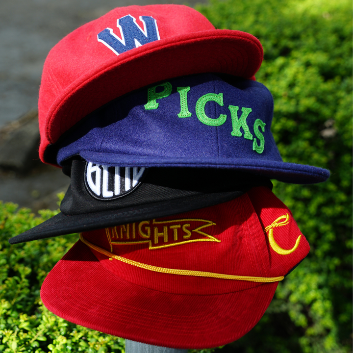 official league x west coast league hats