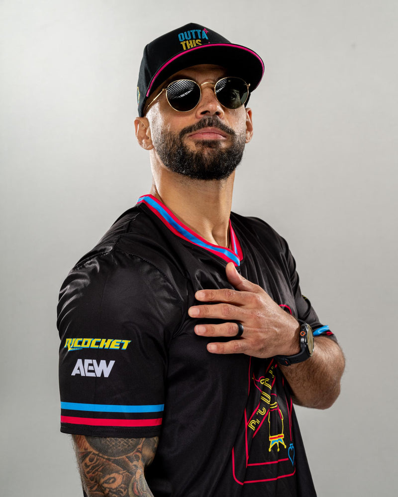 Ricochet wearing his Las Vegas Lights jersey and hat