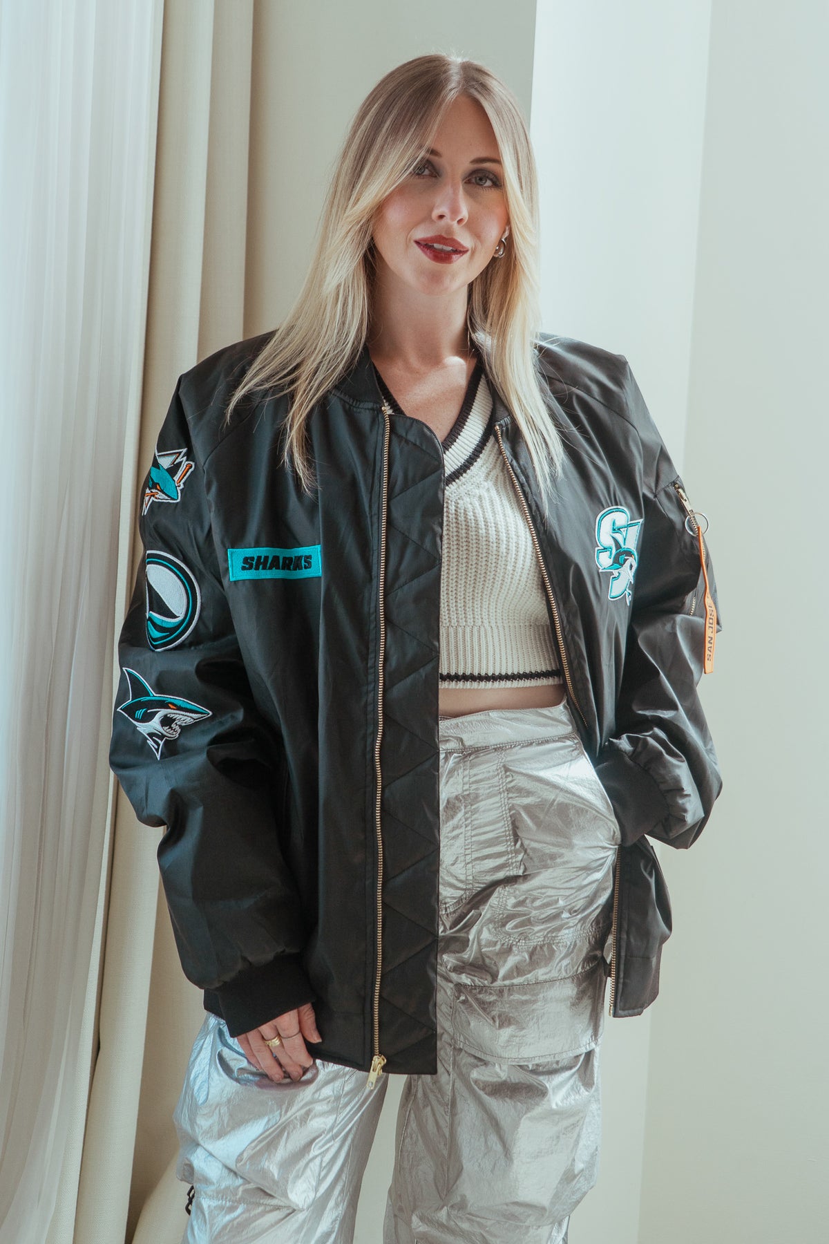 San Jose Sharks flight jacket worn by a model