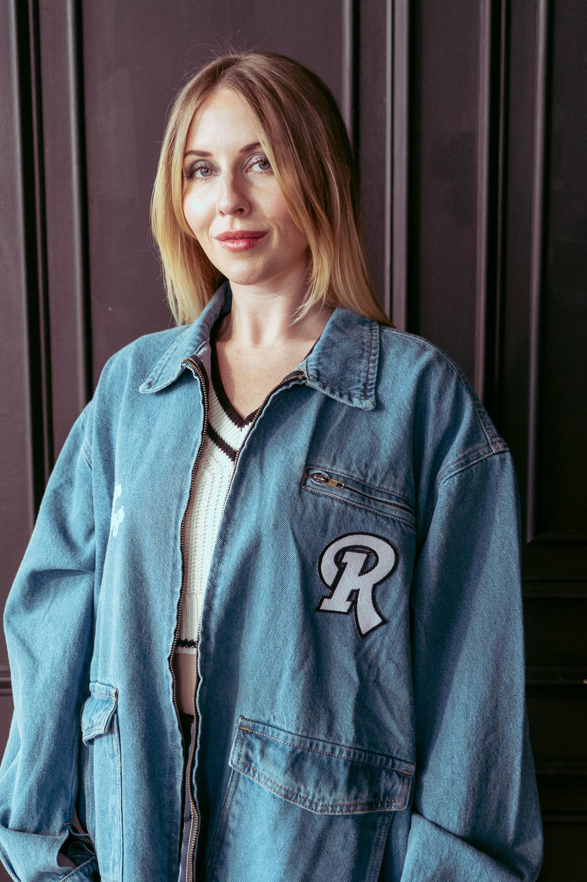 Rochester Red Wings denim jacket worn by a model