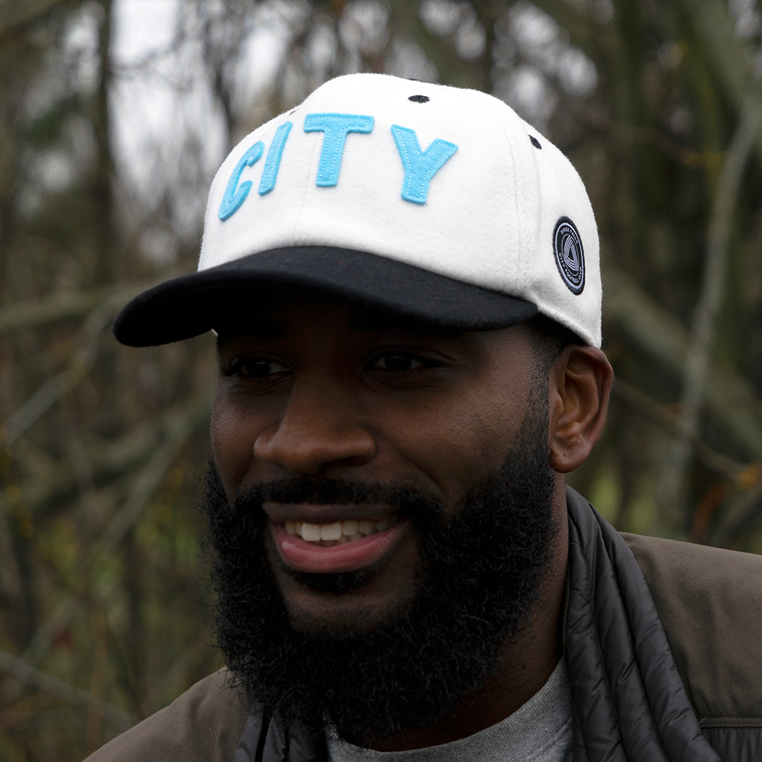 guy wearing sioux falls city fc wool hat